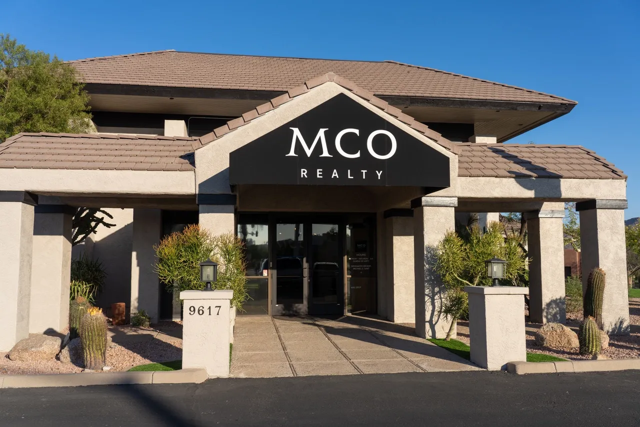 mco realty grand opening